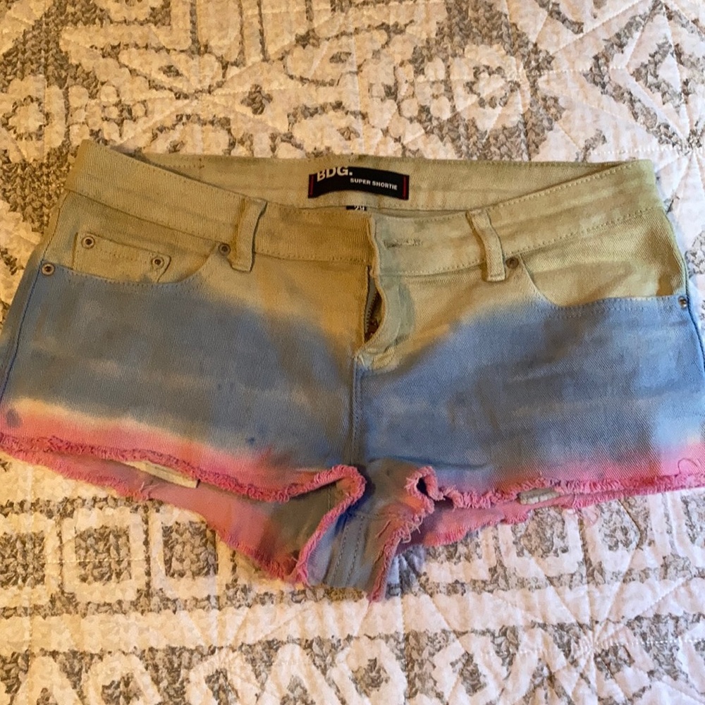 Colorful tri-colored Jean shorts.
